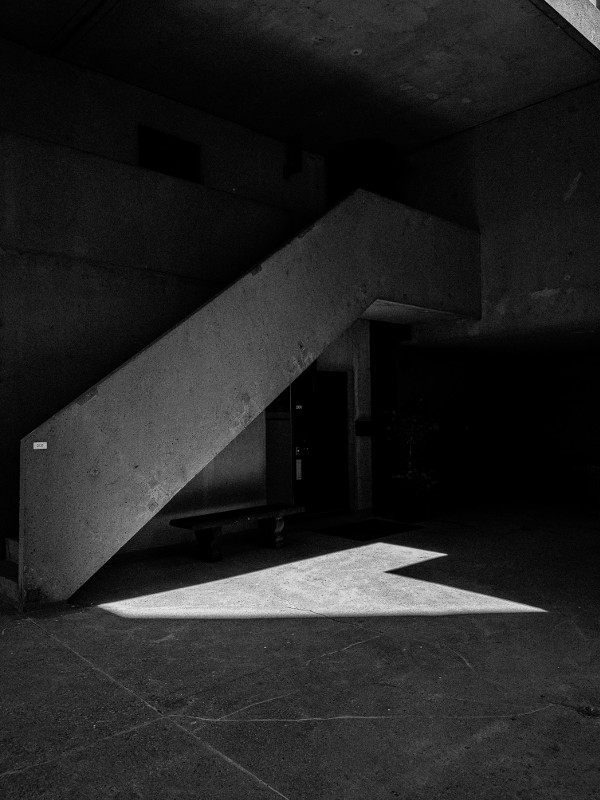 Dark, concrete, brutalist style stairs